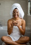Smiling Woman Applying Facial Mask in Bathroom for Skincare Relaxation