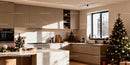 Modern kitchen with festive Christmas decorations and tree