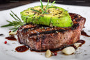 Juicy Grilled Steak with Avocado Herb Topping and Garnish