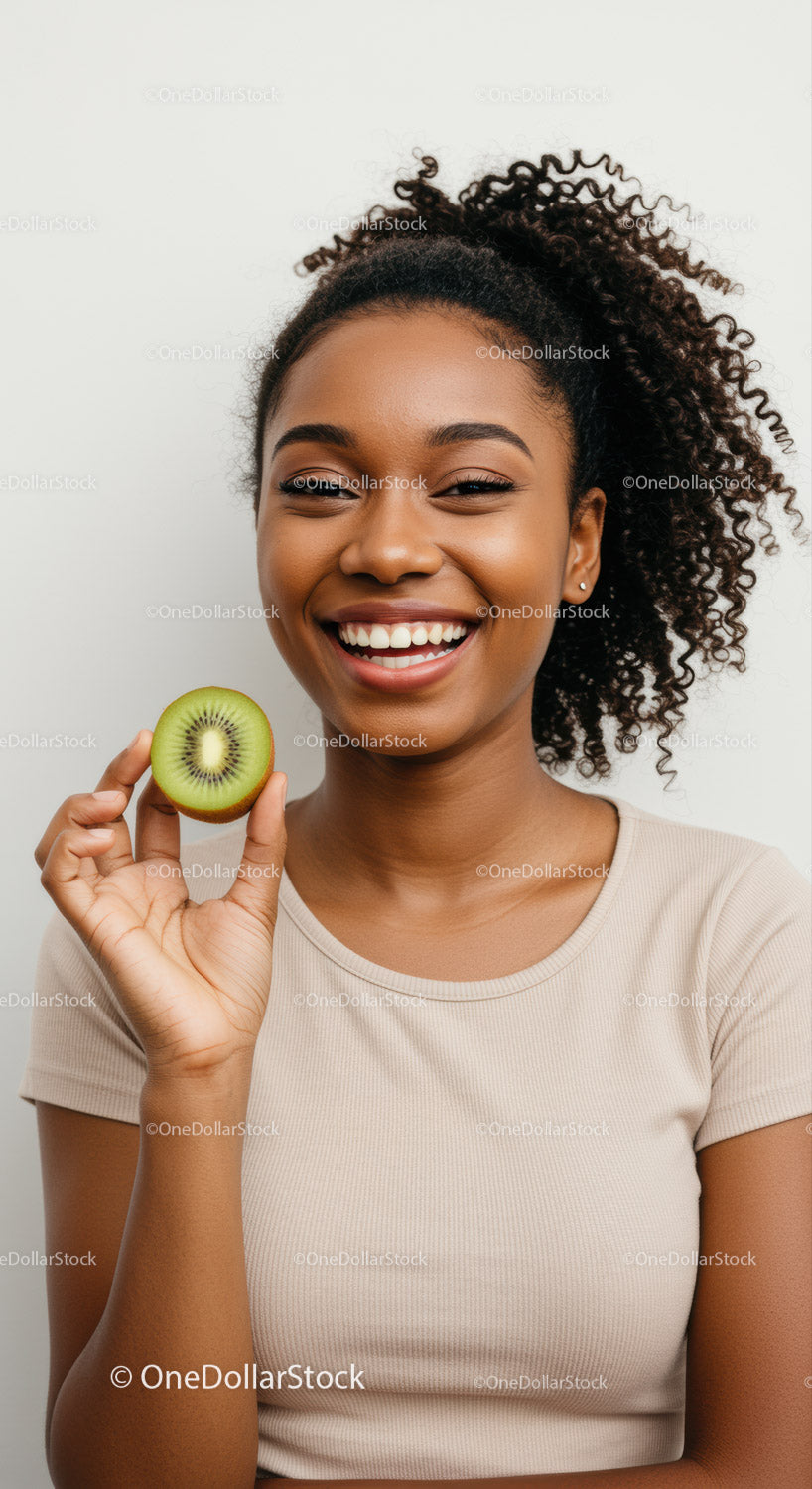 Smiling Woman Holding Kiwi Portrait of Happiness and Healthy Lifestyle