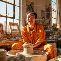 Joyful Woman Creating Handmade Pottery in Artistic Studio