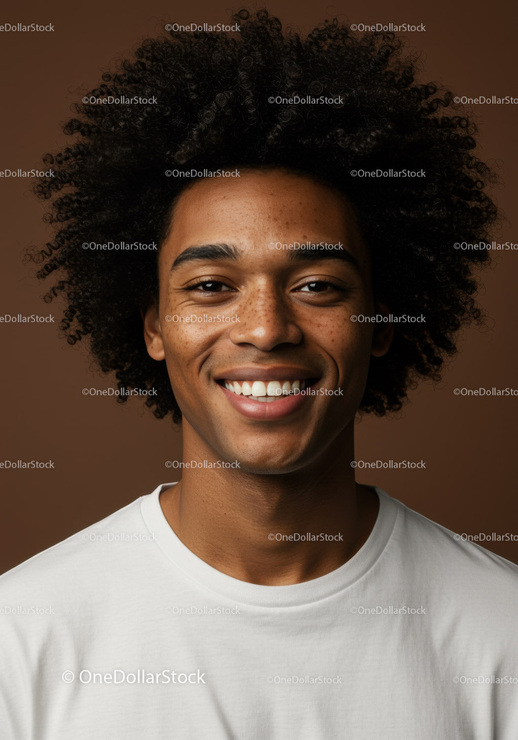 Smiling Man with Curly Hair and Bright Expression