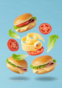 Ham Sandwiches with Cheese Lettuce and Tomato on Blue
