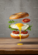 Flying bagel sandwich with egg and sun-dried tomatoes