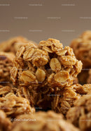 Crunchy oat granola clusters close up view