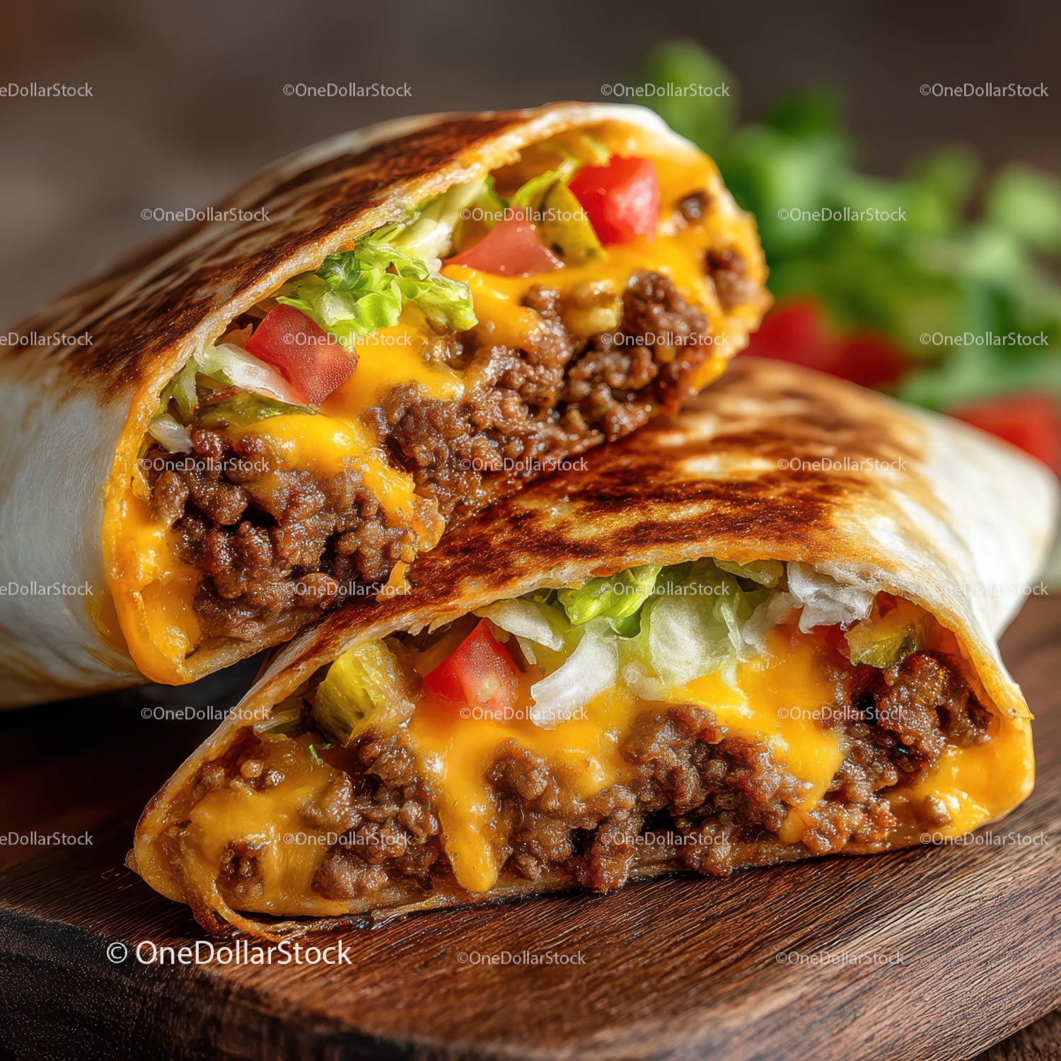 Beef Burrito with Lettuce Tomatoes and Cheddar Cheese in Tortilla