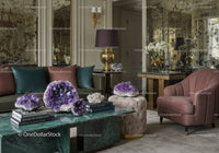 Elegant living room with amethyst crystals and plush seating