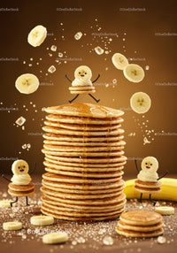 Stack of fluffy pancakes with playful banana characters