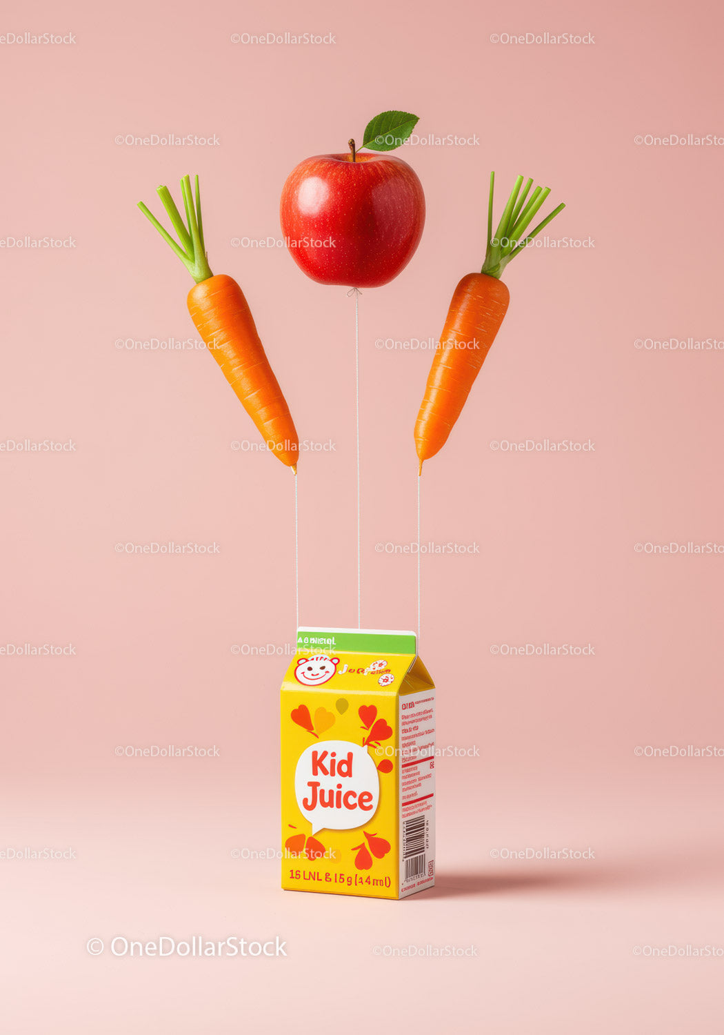 Kid juice box lifted by apple and carrot balloons