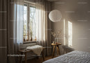 Cozy bedroom corner with natural light and rustic decor