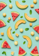 Fresh watermelon and melon slices with mint leaves