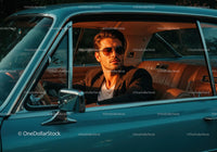 Stylish Man Driving Vintage Car During Sunset Outdoor Scene