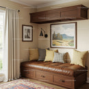 Cozy Living Room with Cushioned Bench and Landscape Art