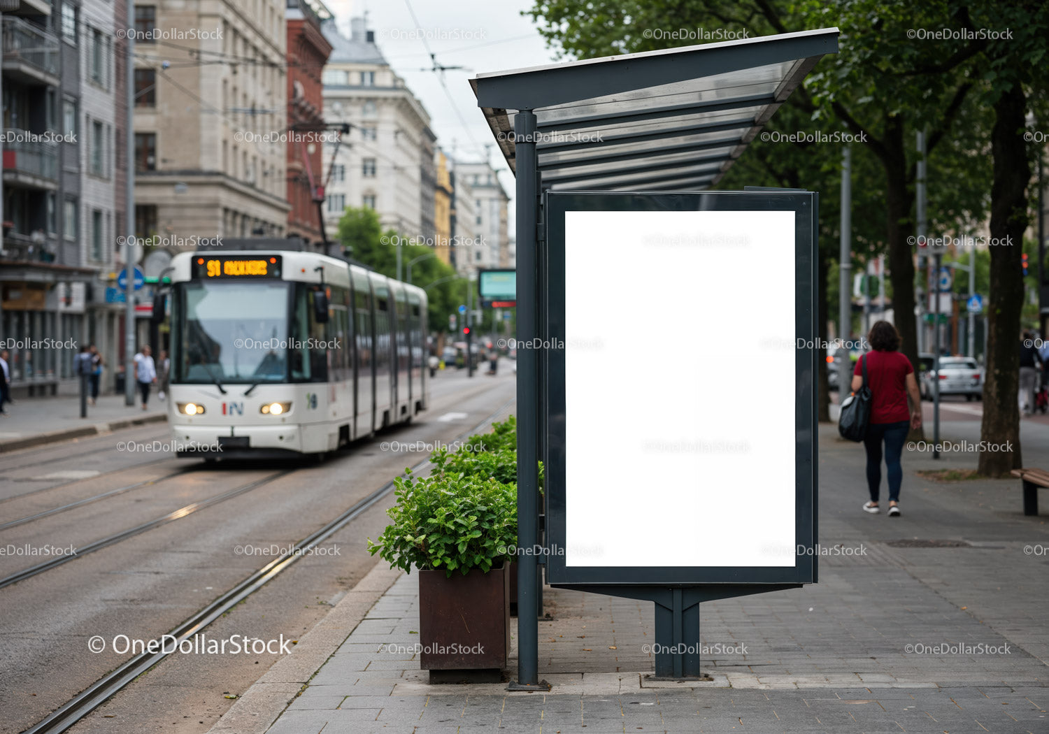 Urban tram stop with blank advertising panel and passerby
