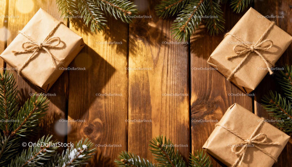 Wrapped Gifts with Pine Branches on Wooden Table