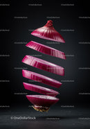 Floating sliced red onion with dark background