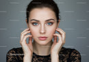 Close-Up of Young Woman with Bright Blue Eyes and Flawless Skin