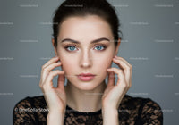 Close-Up of Young Woman with Bright Blue Eyes and Flawless Skin