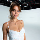 Portrait of a Smiling Young Woman in Casual Summer Dress