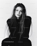 Elegant Black and White Portrait of a Confident Young Woman