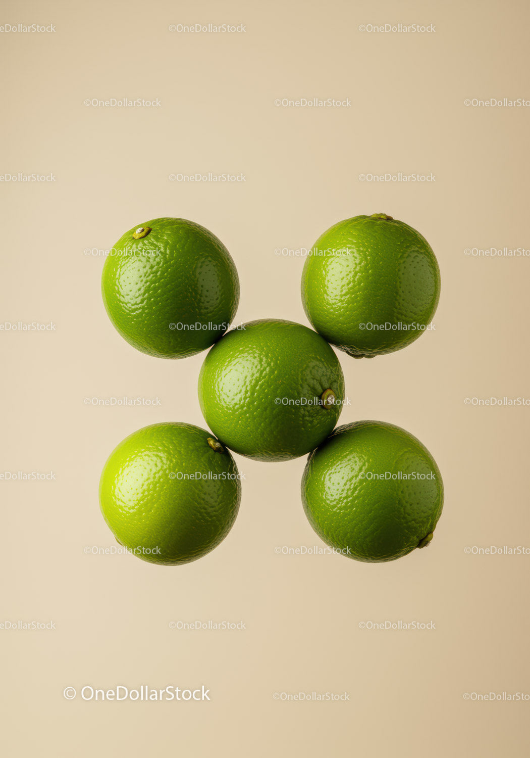 Arrangement of fresh green limes on neutral background