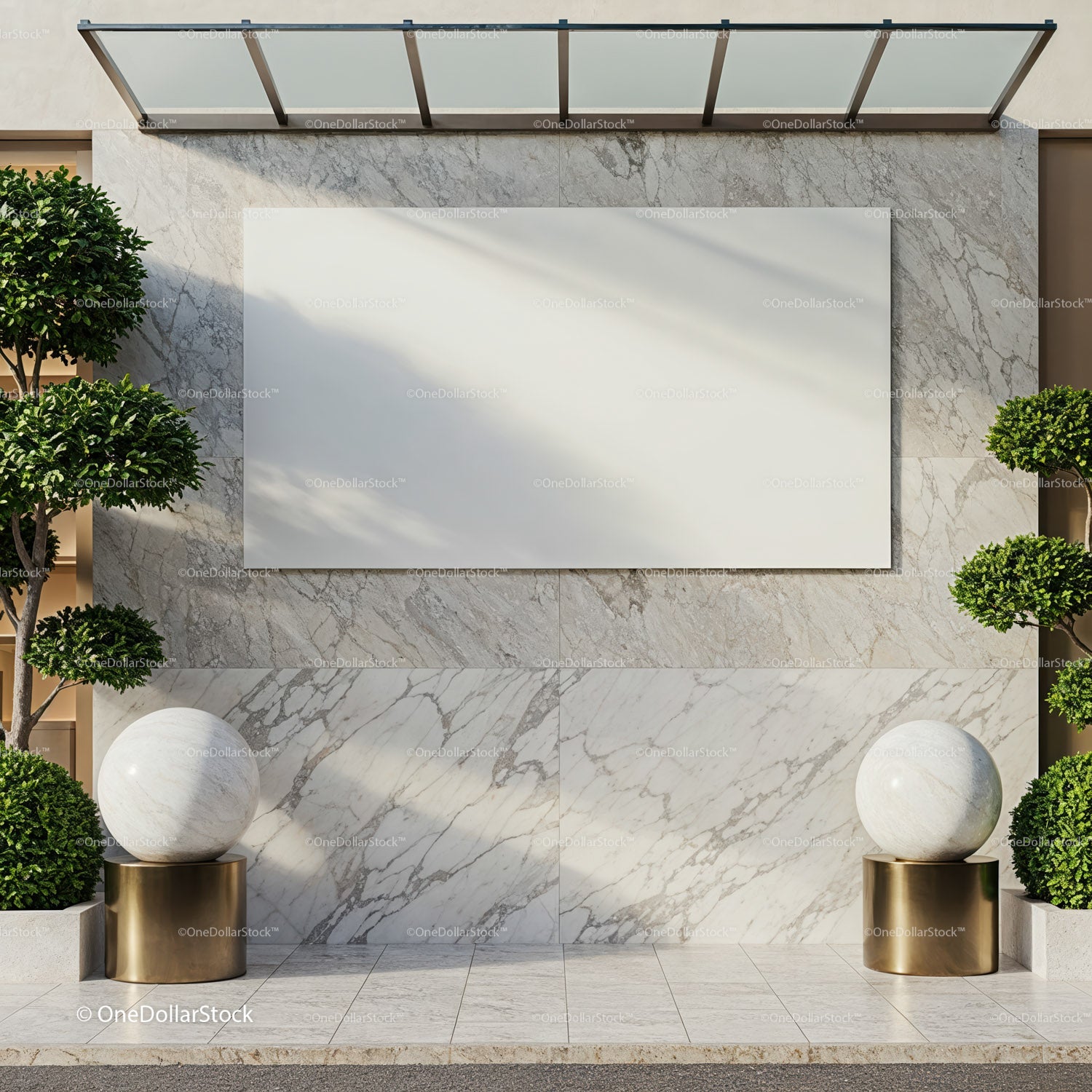 Modern marble outdoor wall with spherical sculptures and greenery