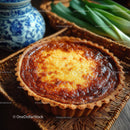 Seafood Shrimp Quiche with Fresh Herbs on Rustic Wooden Table