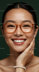 Smiling woman with glasses and pearl bracelet closeup
