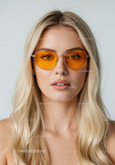 Stylish Woman Wearing Yellow Sunglasses and Blonde Hair