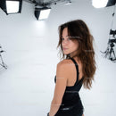 Professional Studio Portrait of a Confident Brunette Woman in Black Tank Top