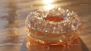Luxurious Golden Glass Gemstone with Sparkling Glitter in Sunlight