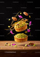 Pistachio Tarts with Caramel and Flower Petals in Air