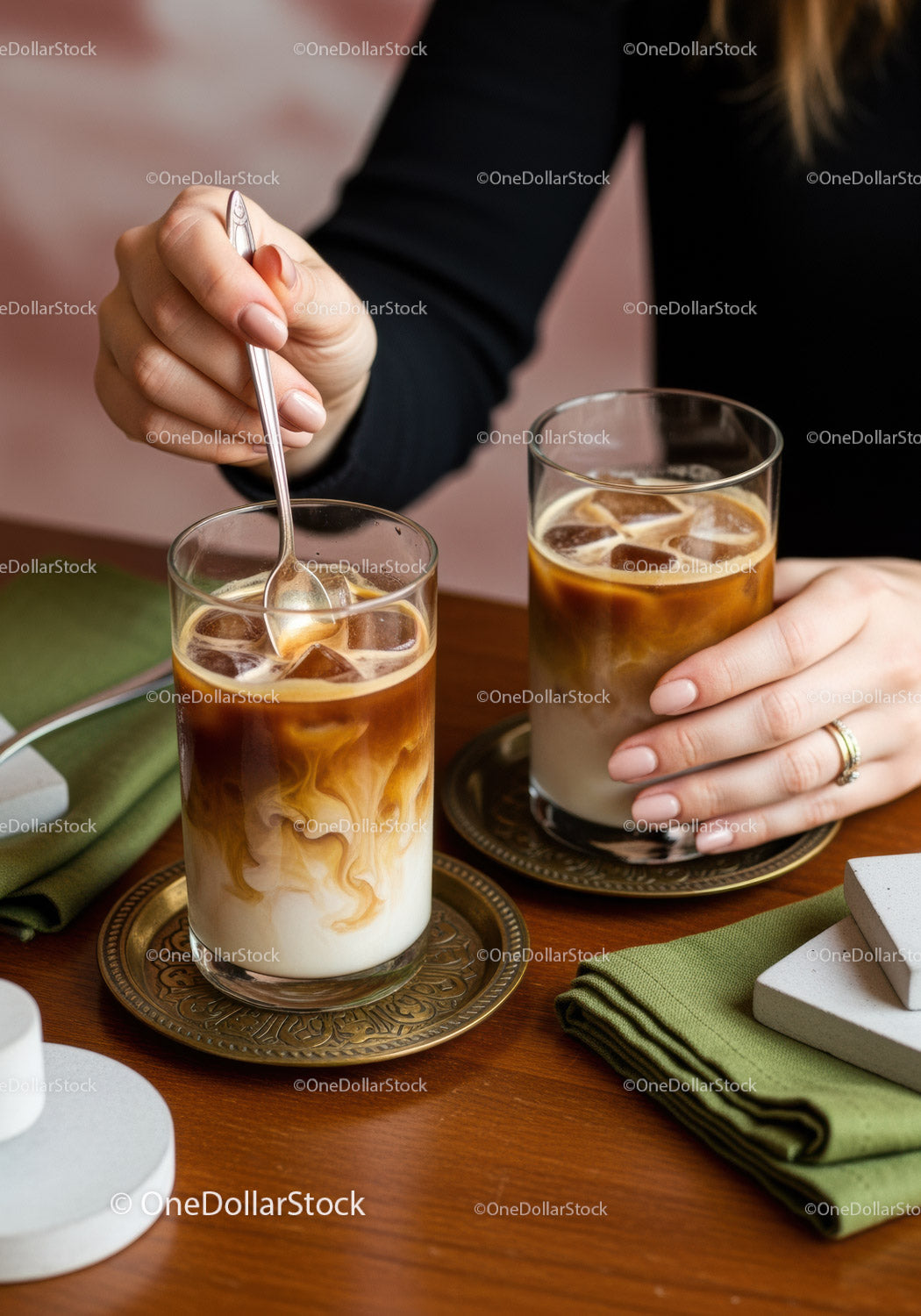 Refreshing Iced Coffee with Milk Swirls in Stylish Glasses