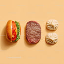 Gourmet Burger with Lettuce and Tomato Next to Grilled Steak and Dumpling