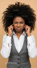 Frustrated Woman Covering Ears with Annoyed Expression