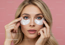 Woman Applying Eye Patches for Skincare Relaxation