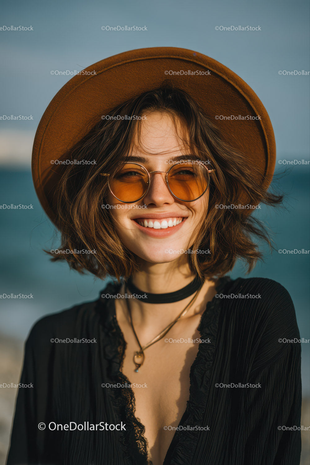 Smiling Woman Wearing Straw Hat and Sunglasses at Beach