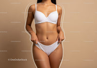Elegant Woman in White Lingerie Standing with Confident Pose