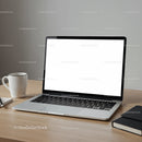 Modern laptop with coffee cup and notebook on desk