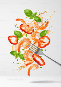 Fresh shrimp salad ingredients with basil and pepper splash