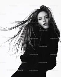 Elegant Black and White Fashion Portrait of a Woman with Flowing Hair