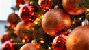 Close-up of Shiny Red and Orange Christmas Ornaments
