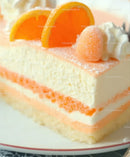 Delicious Orange and Vanilla Layer Cake with Citrus Garnish