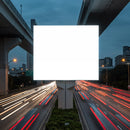 Empty Billboard Above Busy City Highway at Dusk