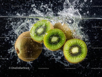 Fresh Kiwi Slices Splashing in Water
