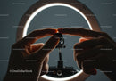 Detailed View of Scientist Adjusting Microscope in Modern Laboratory