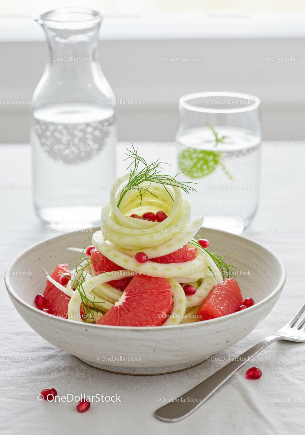 Fresh fennel and grapefruit salad with pomegranate seeds