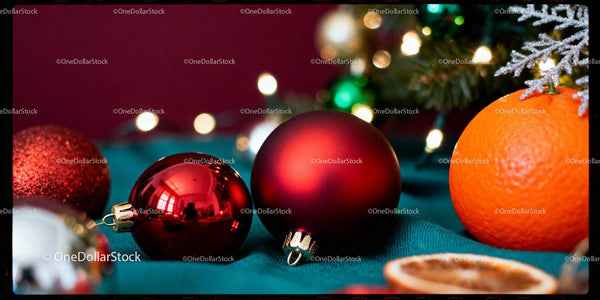 Festive Red Ornaments and Orange on Holiday Decor