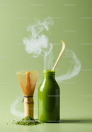 Green Matcha Tea in Bottle with Traditional Whisk
