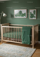 Modern Nursery with Green Wall and Tropical Leaf Art